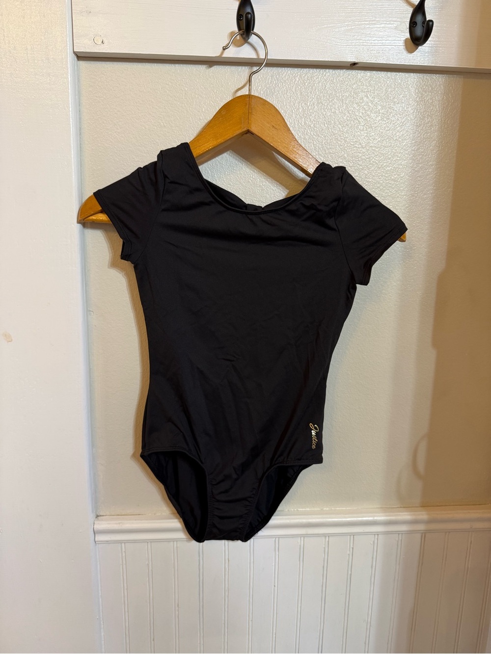 Justice Black Short Sleeve Kids One-Piece Bodysuit